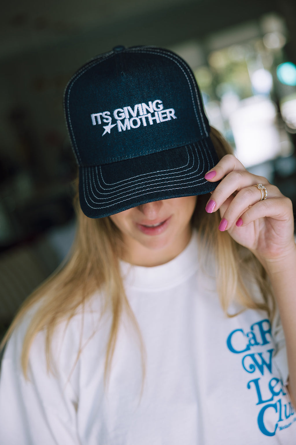 It's giving Mother Trucker Hat